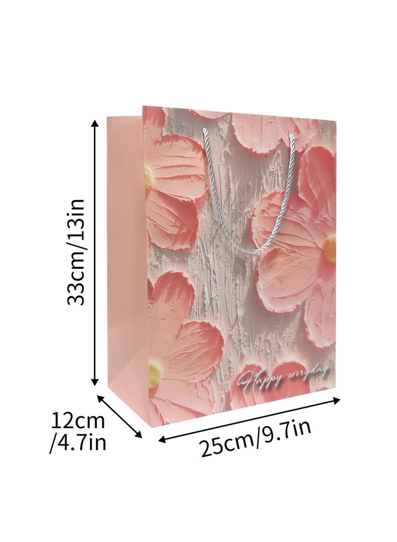 حزمتان من أكياس الهدايا الكبيرة لعيد الميلاد - 25 × 33 سم، تصميم زهري باللون الوردي مع مقابض، مناسبة للنساء والفتيات، لتزيين حفلات أعياد الميلاد - Image 2